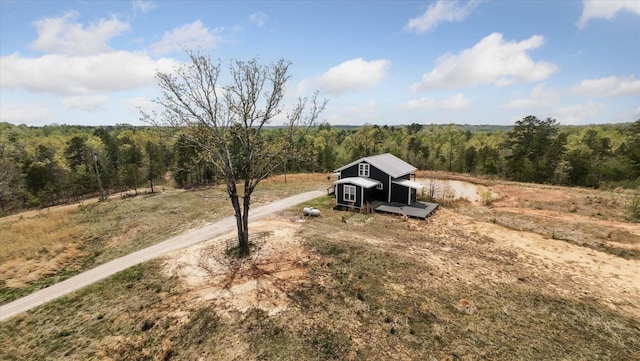 bird's eye view featuring a rural view and a forest view