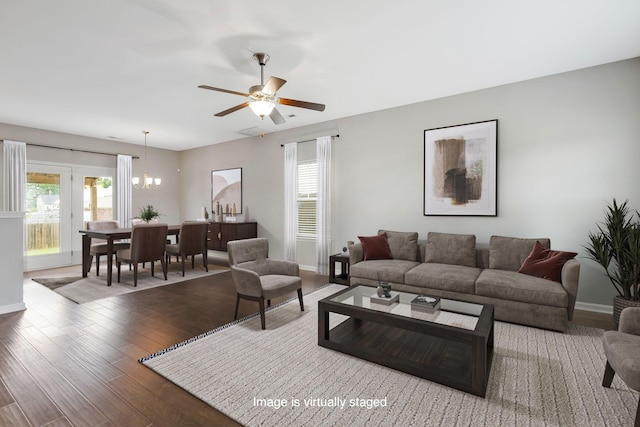614 Whirlaway Dr, Burns, TN 37029 - living area with a chandelier, wood finished floors, and ceiling fan
