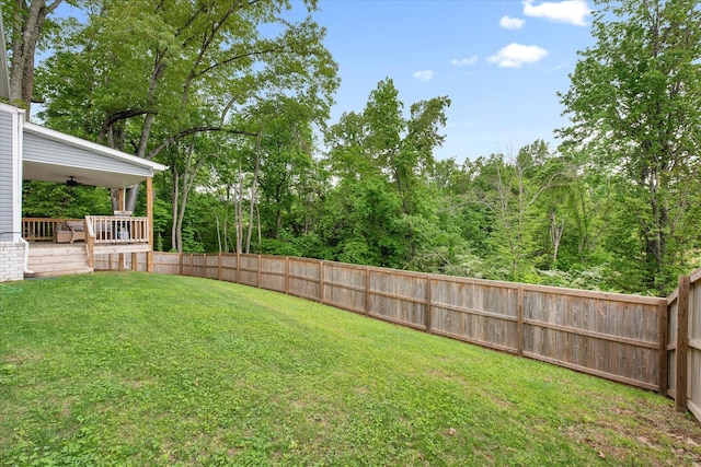 view of yard featuring a ceiling fan