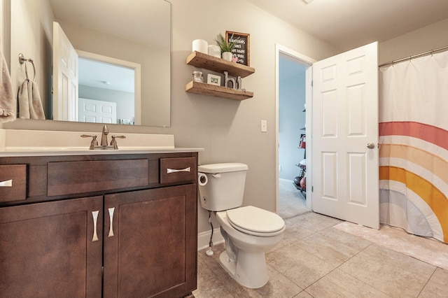 full bath featuring toilet, baseboards, curtained shower, tile patterned floors, and vanity