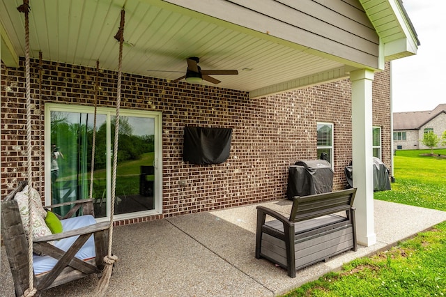 view of patio / terrace featuring grilling area and a ceiling fan