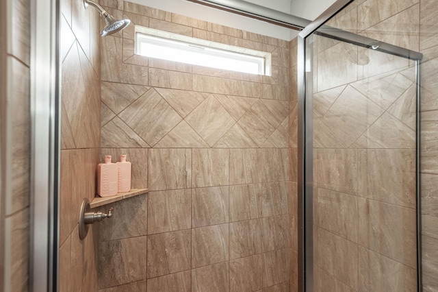 bathroom with a stall shower