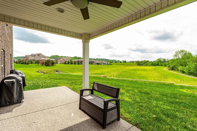 view of patio / terrace featuring a ceiling fan