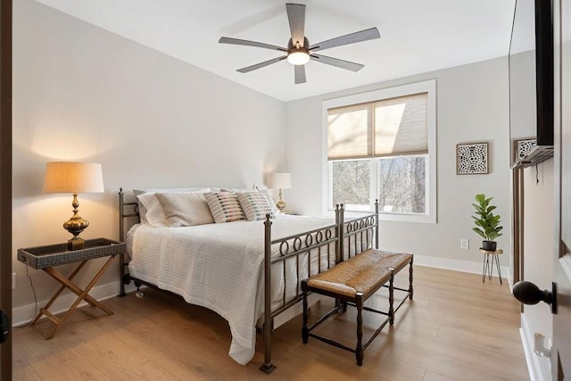 48 Hasty Hill Rd, Lynchburg, TN 37352 - bedroom with light wood finished floors, baseboards, and ceiling fan