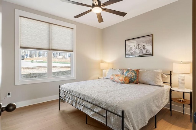 48 Hasty Hill Rd, Lynchburg, TN 37352 - bedroom with baseboards, a ceiling fan, and wood finished floors