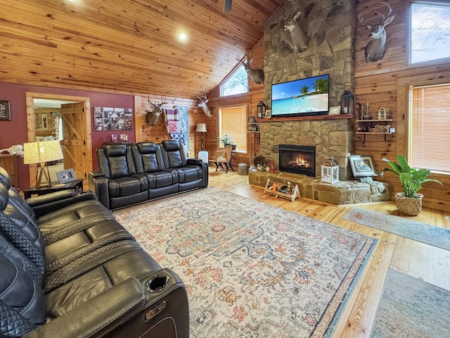 130 Wayne Threatt Rd, Dover, TN 37058 - living area featuring wooden walls, hardwood / wood-style floors, and high vaulted ceiling