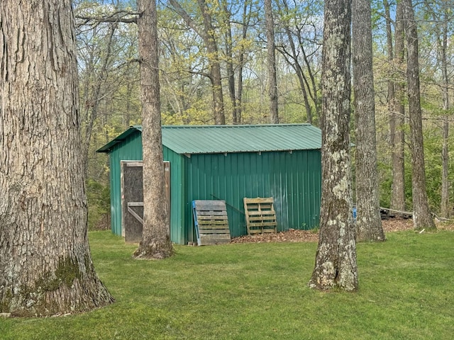130 Wayne Threatt Rd, Dover, TN 37058 - view of pole building with a yard