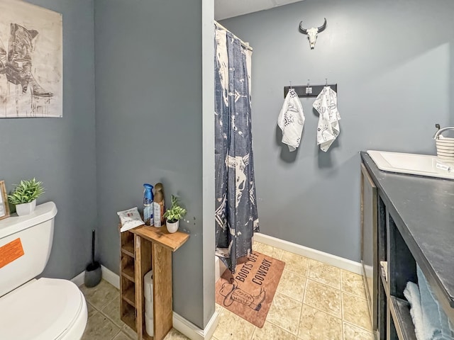 130 Wayne Threatt Rd, Dover, TN 37058 - full bathroom featuring toilet, baseboards, tile patterned flooring, and curtained shower