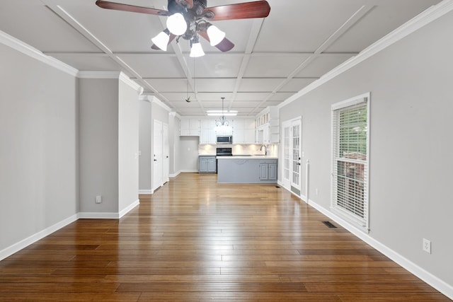 429 Old Oak Way, Hermitage, TN 37076 - unfurnished living room with ceiling fan, baseboards, wood-type flooring, a sink, and ornamental molding
