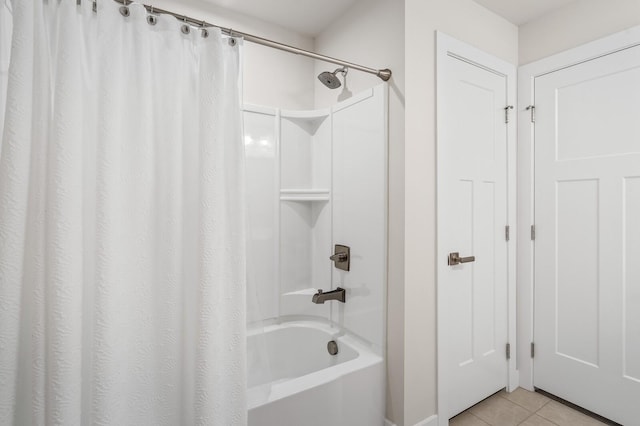 full bath with tile patterned floors and shower / bath combo with shower curtain