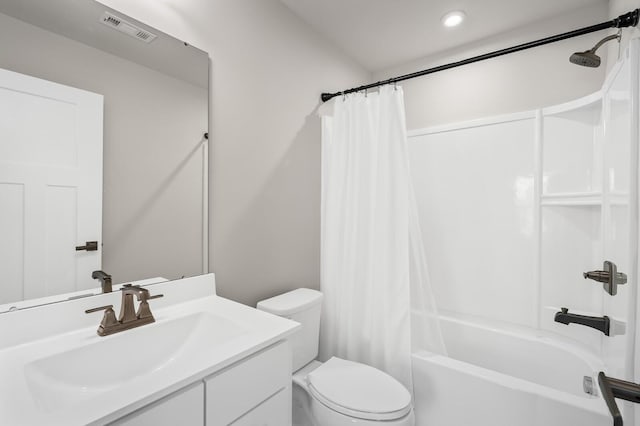 bathroom featuring toilet, vanity, shower / tub combo with curtain, visible vents, and recessed lighting