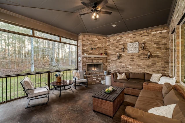 4029 Kings Camp Pass, Arrington, TN 37014 - sunroom / solarium with ceiling fan and an outdoor living space with a fireplace