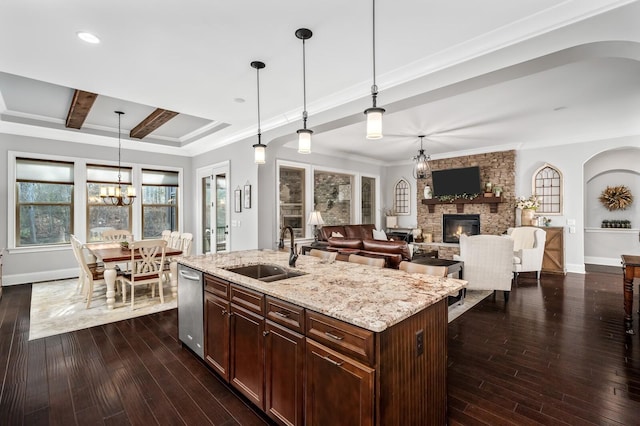 4029 Kings Camp Pass, Arrington, TN 37014 - kitchen with an inviting chandelier, stainless steel dishwasher, arched walkways, and a sink