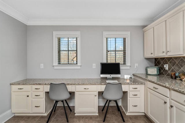 4029 Kings Camp Pass, Arrington, TN 37014 - home office featuring crown molding, built in study area, and dark tile patterned floors