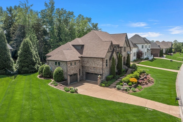 4029 Kings Camp Pass, Arrington, TN 37014 - view of front of property with stone siding, a garage, stairs, driveway, and a front yard