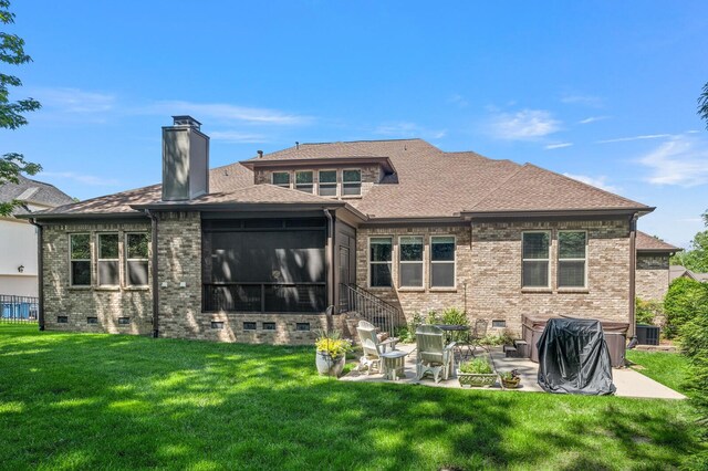 4029 Kings Camp Pass, Arrington, TN 37014 - back of house featuring a patio area, brick siding, a yard, a sunroom, and a chimney