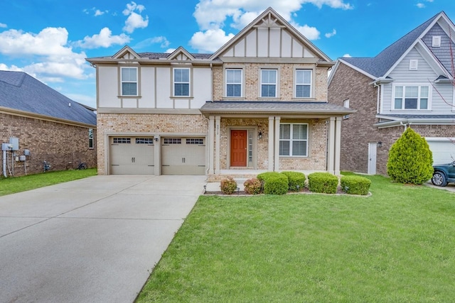 view of front of property featuring an attached garage, a front lawn, brick siding, and driveway