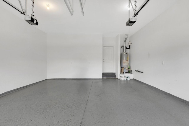 garage with a garage door opener and gas water heater