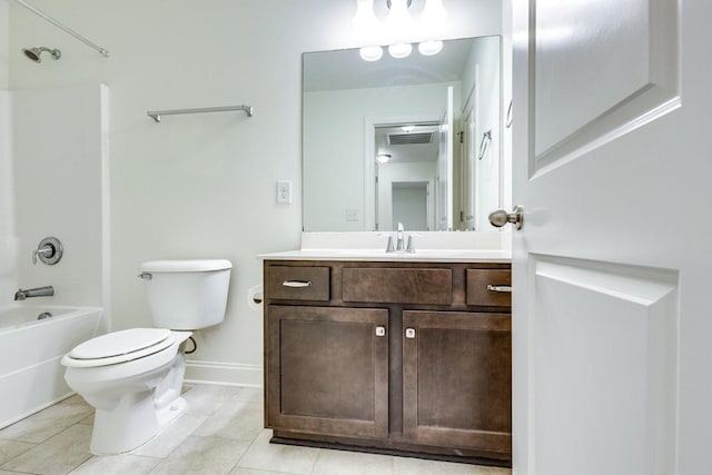 full bathroom with toilet,  shower combination, baseboards, tile patterned flooring, and vanity