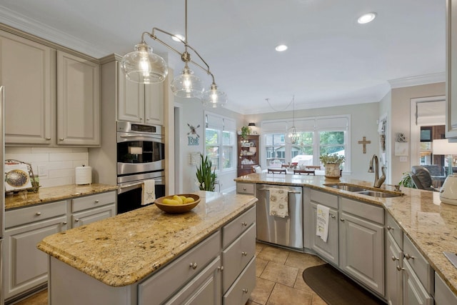 2105 Chels Way, Old Hickory, TN 37138 - kitchen with a center island, ornamental molding, a sink, backsplash, and appliances with stainless steel finishes