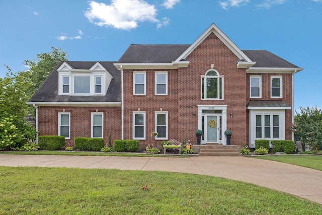 2105 Chels Way, Old Hickory, TN 37138 - colonial home with a front yard, roof with shingles, and brick siding