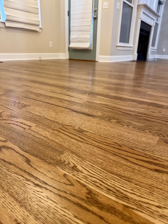 2105 Chels Way, Old Hickory, TN 37138 - unfurnished living room with baseboards, a fireplace, and dark wood-style floors