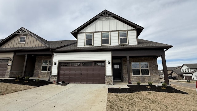 craftsman house featuring concrete driveway, stone siding, a porch, and board and batten siding