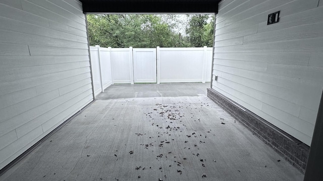 view of patio / terrace featuring fence