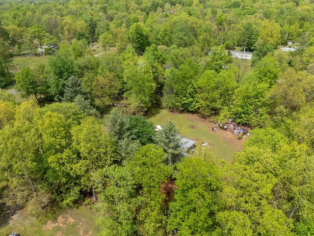 bird's eye view featuring a forest view