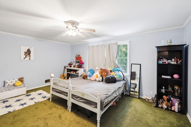bedroom featuring carpet flooring, ornamental molding, a ceiling fan, and baseboards