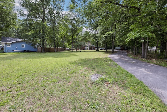 view of yard with fence