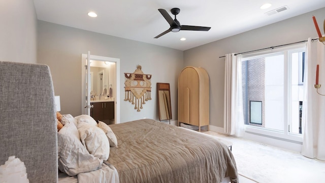 bedroom with carpet floors, ensuite bathroom, visible vents, ceiling fan, and recessed lighting