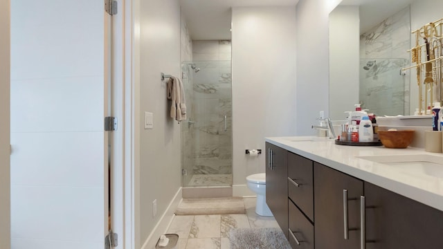 bathroom featuring toilet, a sink, baseboards, a shower stall, and marble finish floor