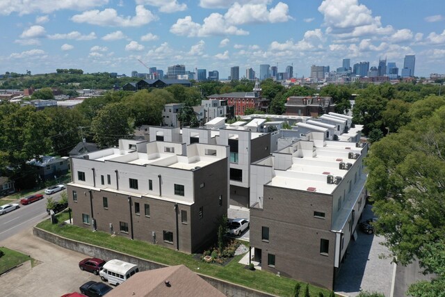 drone / aerial view with a view of city