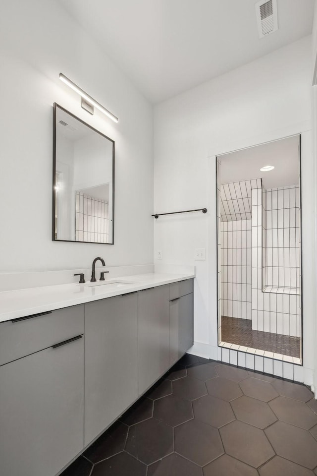 5734 Willoughby Way, Murfreesboro, TN 37129 - full bath featuring vanity, tile patterned flooring, visible vents, and a tile shower