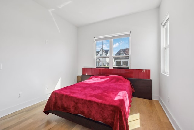 5734 Willoughby Way, Murfreesboro, TN 37129 - bedroom with baseboards and wood finished floors