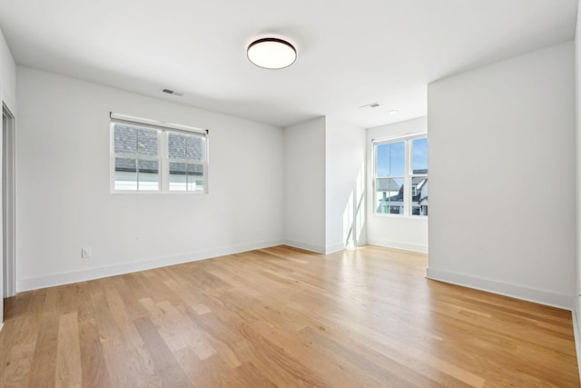 5734 Willoughby Way, Murfreesboro, TN 37129 - spare room featuring light wood finished floors, baseboards, and a healthy amount of sunlight