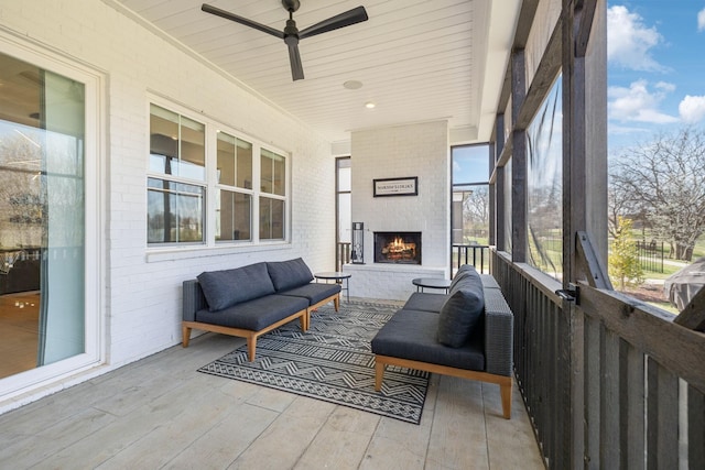 5734 Willoughby Way, Murfreesboro, TN 37129 - sunroom / solarium featuring a ceiling fan, a healthy amount of sunlight, and an outdoor living space with a fireplace