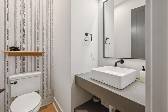 5734 Willoughby Way, Murfreesboro, TN 37129 - half bathroom with toilet, baseboards, and a sink
