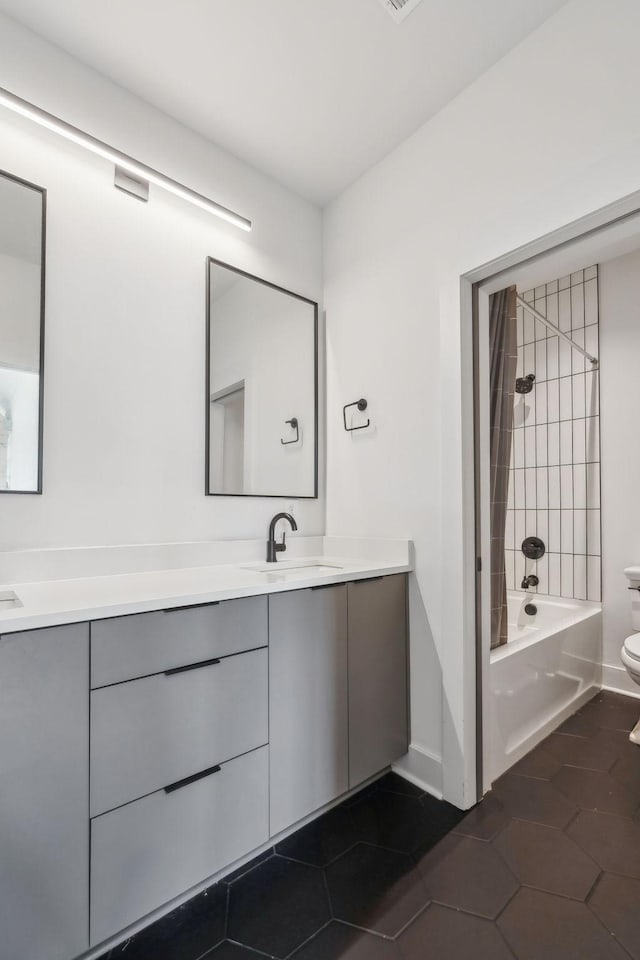 5734 Willoughby Way, Murfreesboro, TN 37129 - full bath with double vanity, toilet, bathtub / shower combination, a sink, and baseboards