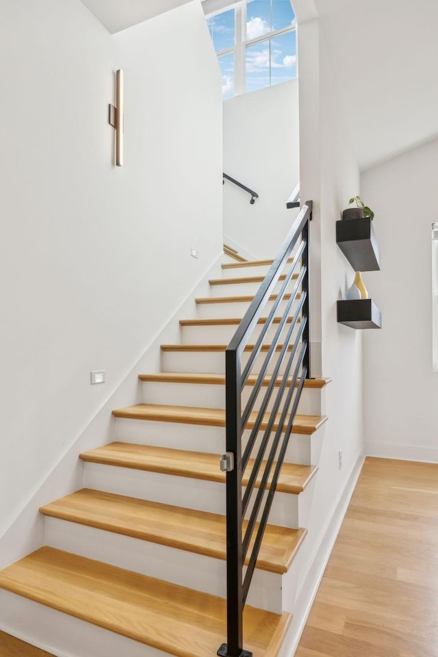 5734 Willoughby Way, Murfreesboro, TN 37129 - stairway featuring baseboards and wood finished floors