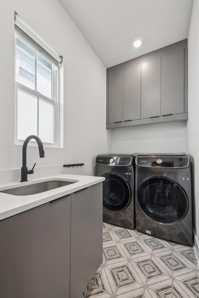 5734 Willoughby Way, Murfreesboro, TN 37129 - clothes washing area with a sink, cabinet space, and washer and dryer
