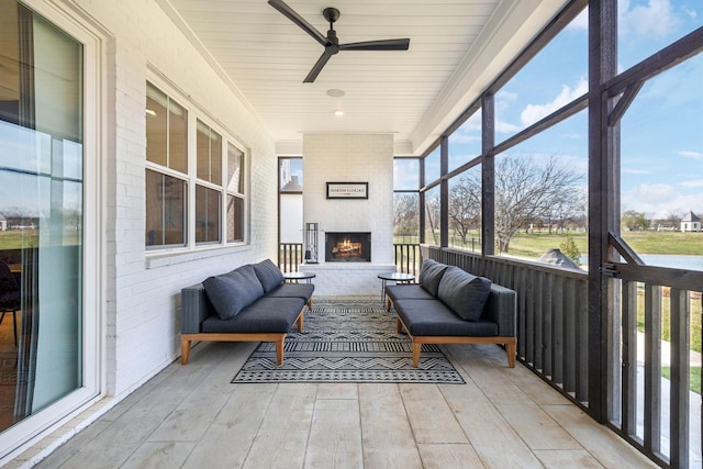 5734 Willoughby Way, Murfreesboro, TN 37129 - sunroom / solarium with an outdoor living space with a fireplace and ceiling fan