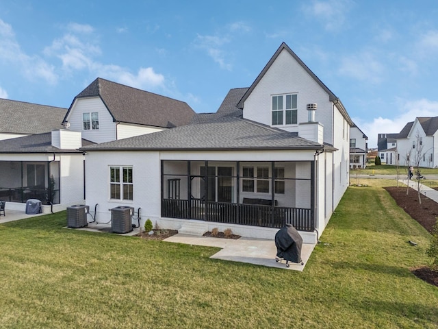 5734 Willoughby Way, Murfreesboro, TN 37129 - rear view of house with a sunroom, a patio area, a lawn, and central air condition unit