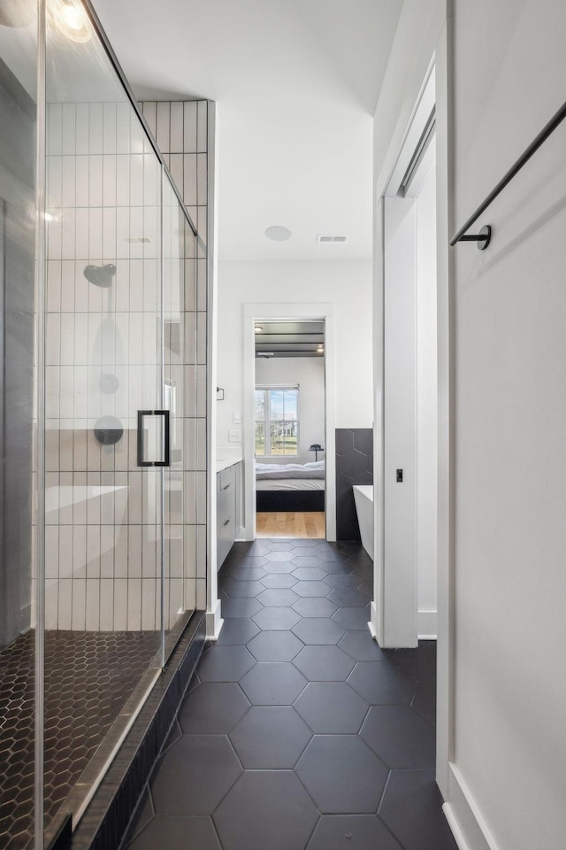 5734 Willoughby Way, Murfreesboro, TN 37129 - bathroom with a stall shower, tile patterned floors, a freestanding bath, visible vents, and vanity