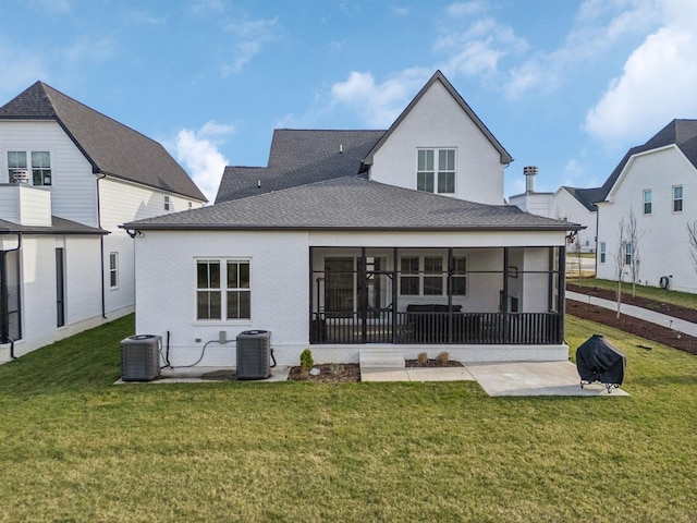 5734 Willoughby Way, Murfreesboro, TN 37129 - rear view of property featuring a sunroom, cooling unit, and a lawn