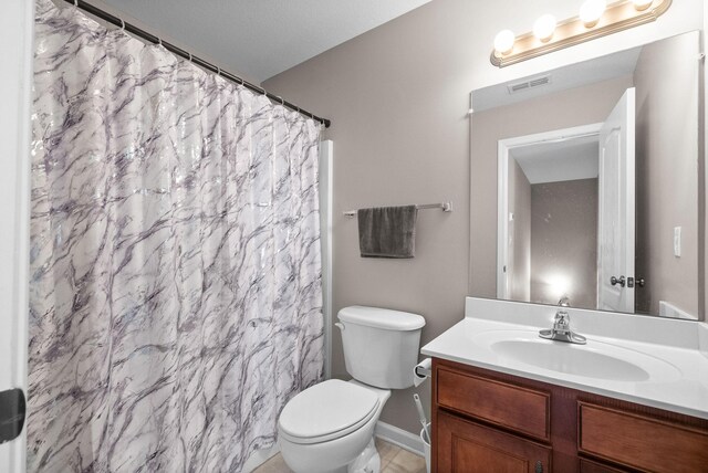 3144 Holly Pt, Clarksville, TN 37043 - full bathroom featuring toilet, visible vents, baseboards, and vanity