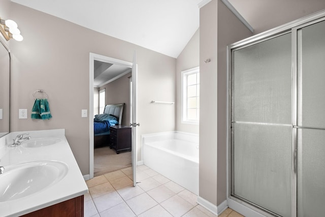 3144 Holly Pt, Clarksville, TN 37043 - ensuite bathroom featuring a garden tub, ensuite bathroom, vaulted ceiling, and a sink