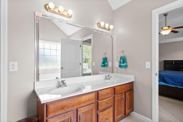 3144 Holly Pt, Clarksville, TN 37043 - full bathroom with connected bathroom, vaulted ceiling, and a sink
