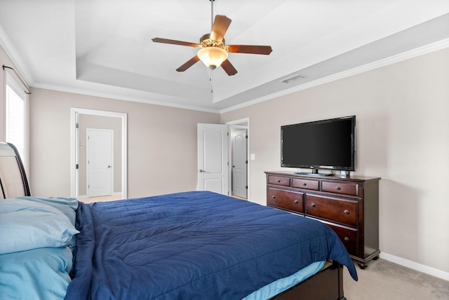 3144 Holly Pt, Clarksville, TN 37043 - bedroom featuring a tray ceiling, visible vents, ceiling fan, light carpet, and ornamental molding